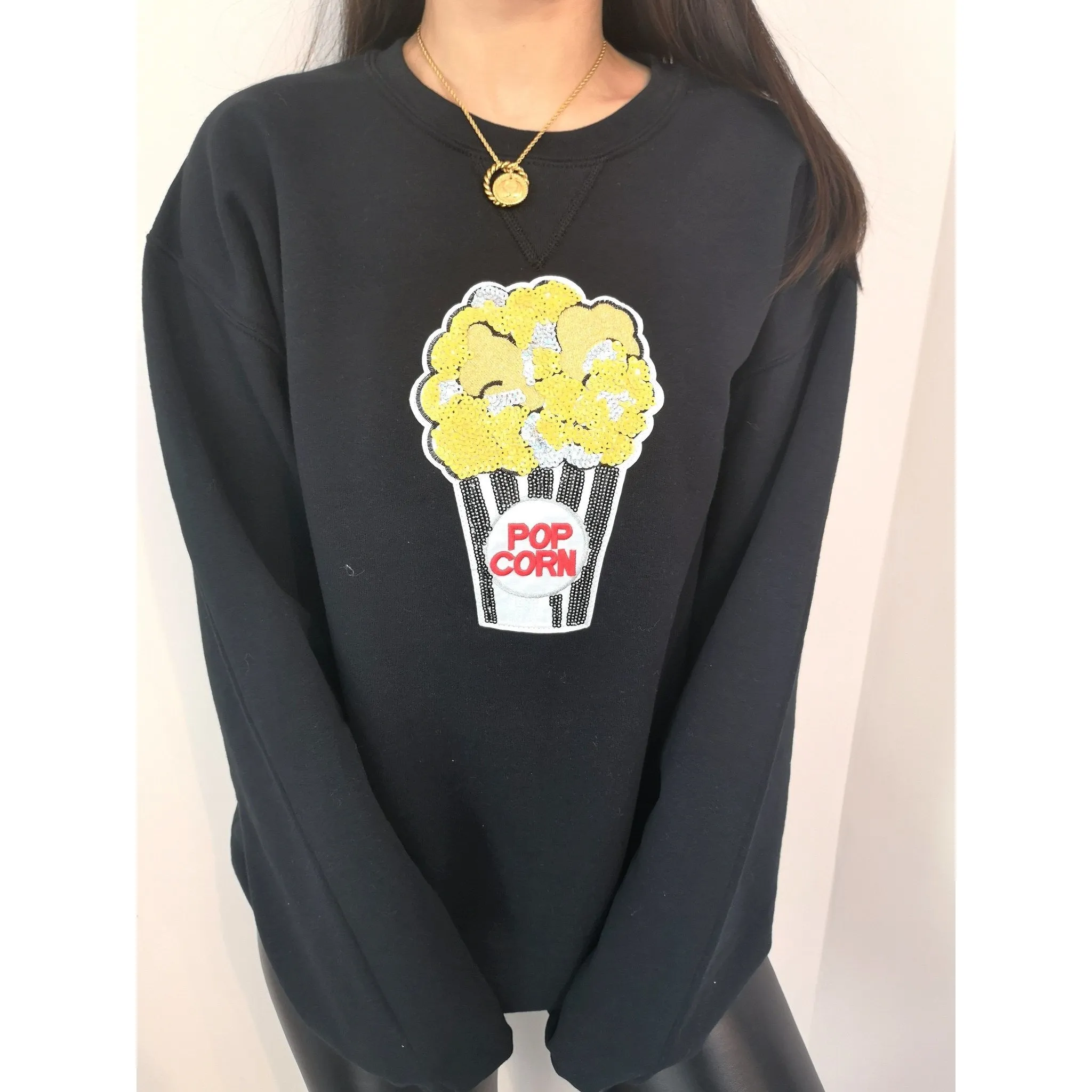 off to the movies crewneck